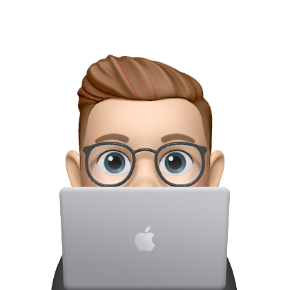 Person peeking behind laptop
